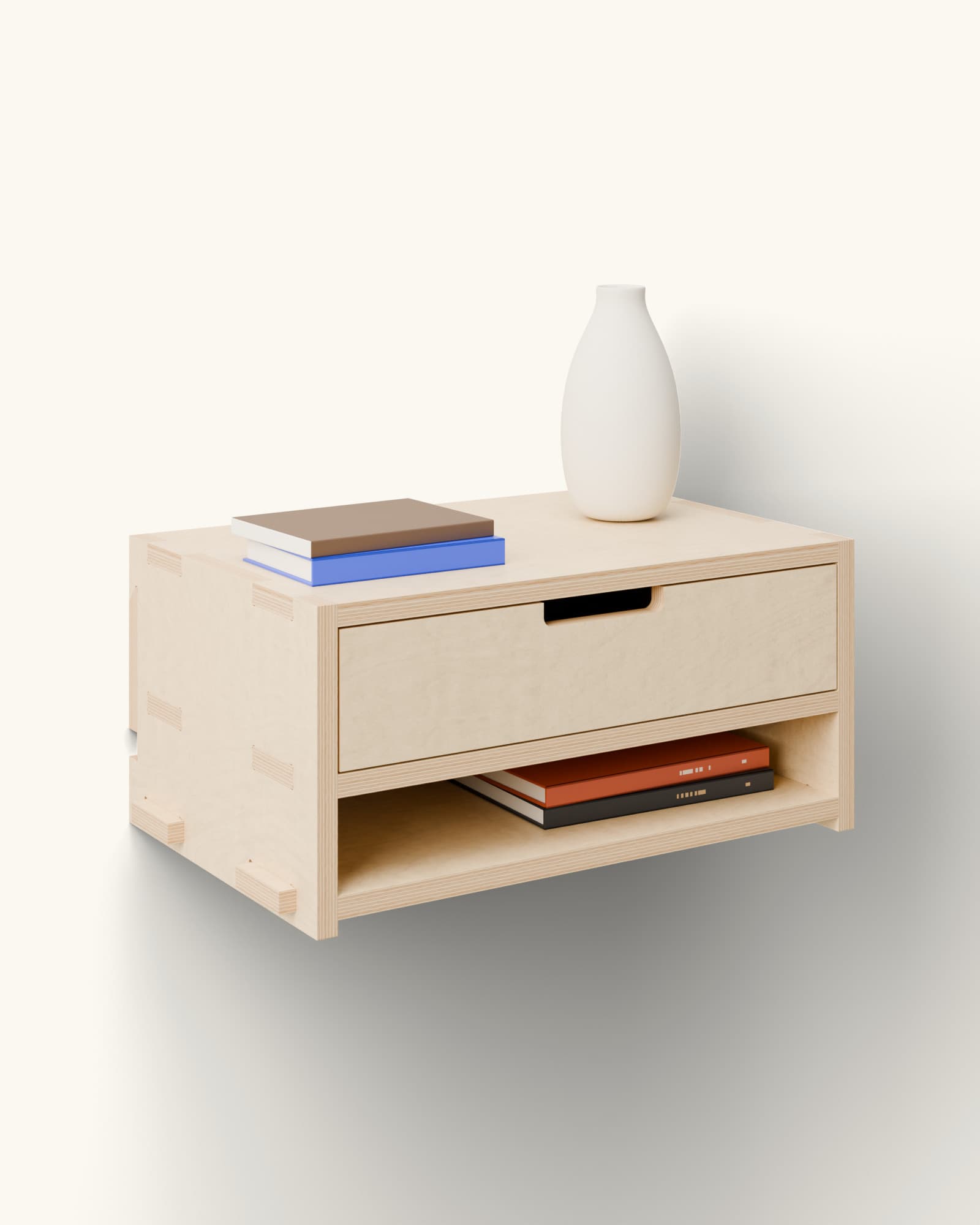 Render of Tirooëreflotanskt hung on the wall: oiled birch, a drawer with a cut-out pull, an open nook with two books, a vase and two books on top