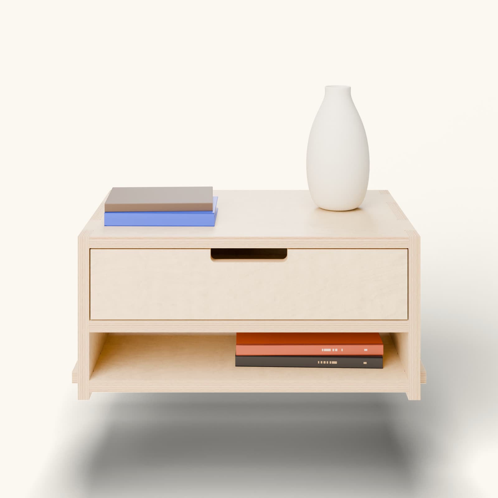 Render of the Tirooëreflotanskt floating nightstand in oiled birch: a drawer with a cut-out pull, an open nook with two books, a vase on top