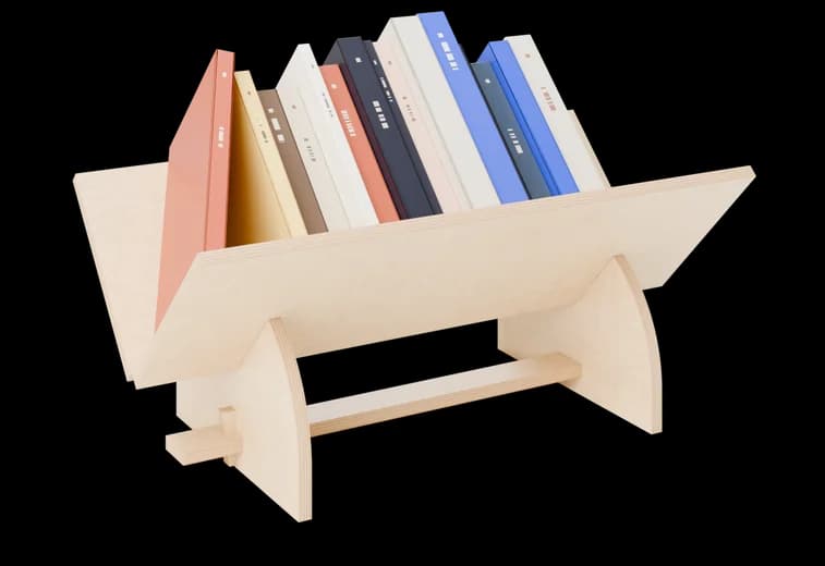 Render of the Räakaliv book stand in oiled birch, a row of books resting in the V